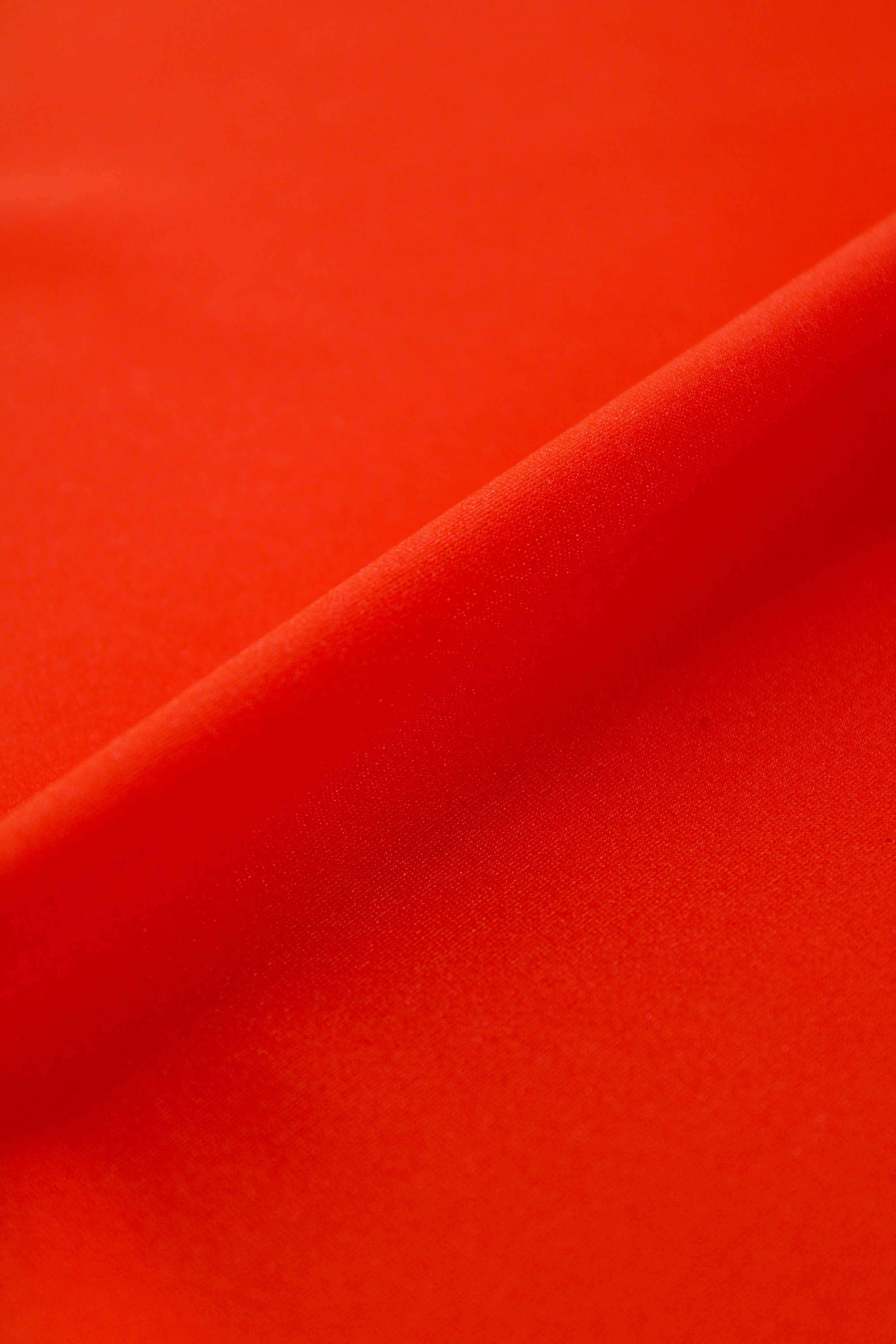 Tricô de lycra laranja