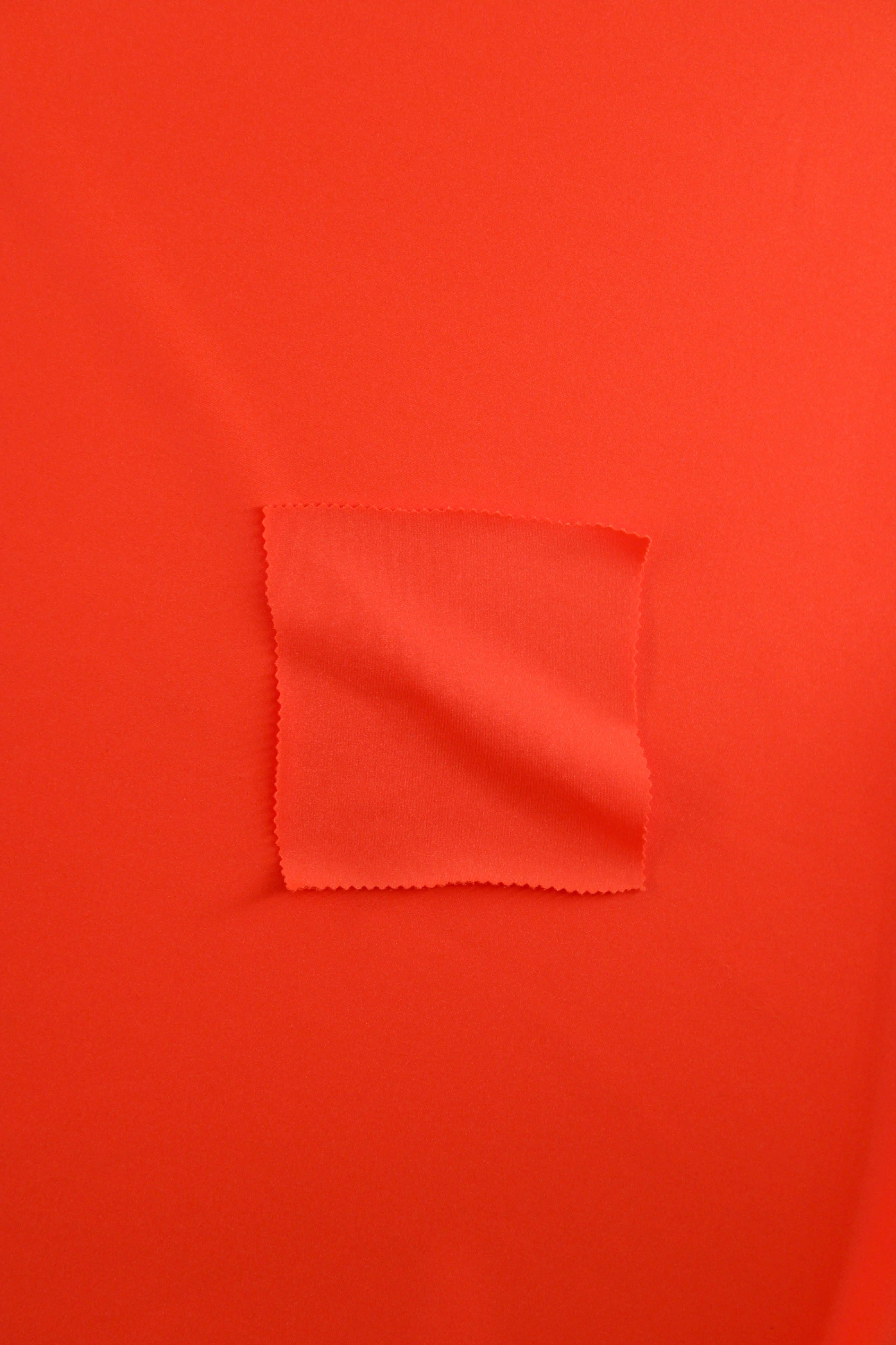 Tricô de lycra laranja