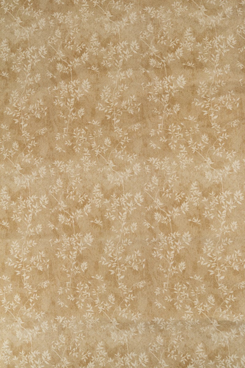 Loneta color caramelo estampado flores