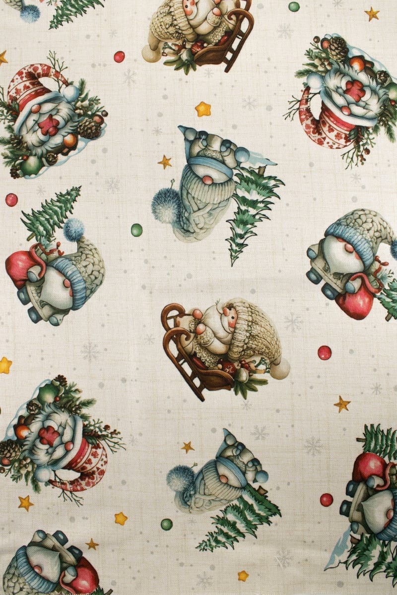 Loneta estampado gnomos navideños blanco roto