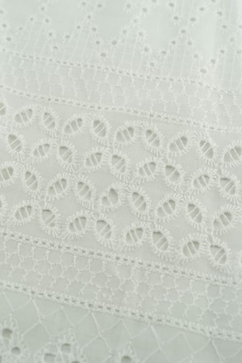 Perforado algodon blanco adelfa