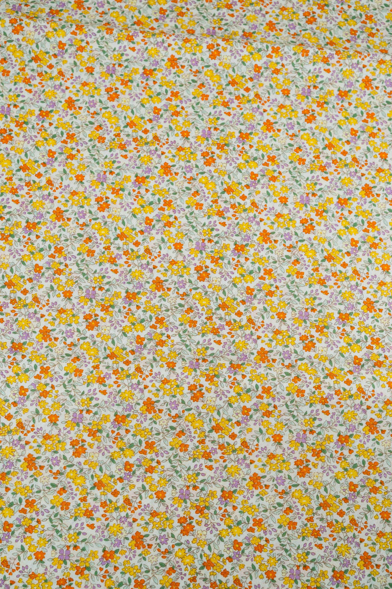 Popelín floral flores liberty naranja